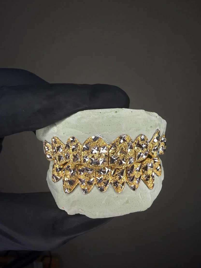 Pineapple Cuts with Diamond Dust Grillz. Intricate diamond-cut pineapple cross-hatching blended with diamond dust texturing. A custom mold kit will be shipped out to you between 2-3 business days.