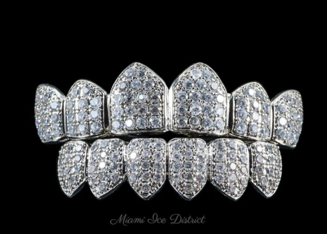 Silver and Moissanite Grill. Heavy sterling silver base flooded with brilliant-cut Moissanite stones.